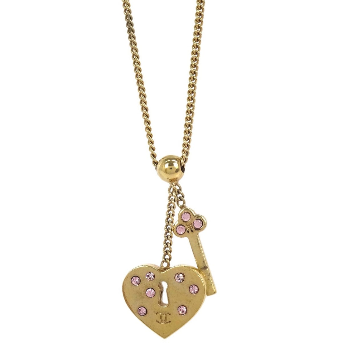 CHANEL 02P Gold Plated Chain Necklace Heart Padlock Key Pendant: CHANEL 02P Gold Plated Chain Necklace Heart Padlock Key Pendant Chanel chain pendant necklace featuring a heart padlock and key motif with rhinestone accents. Crafted in gold-plated metal, this piece 