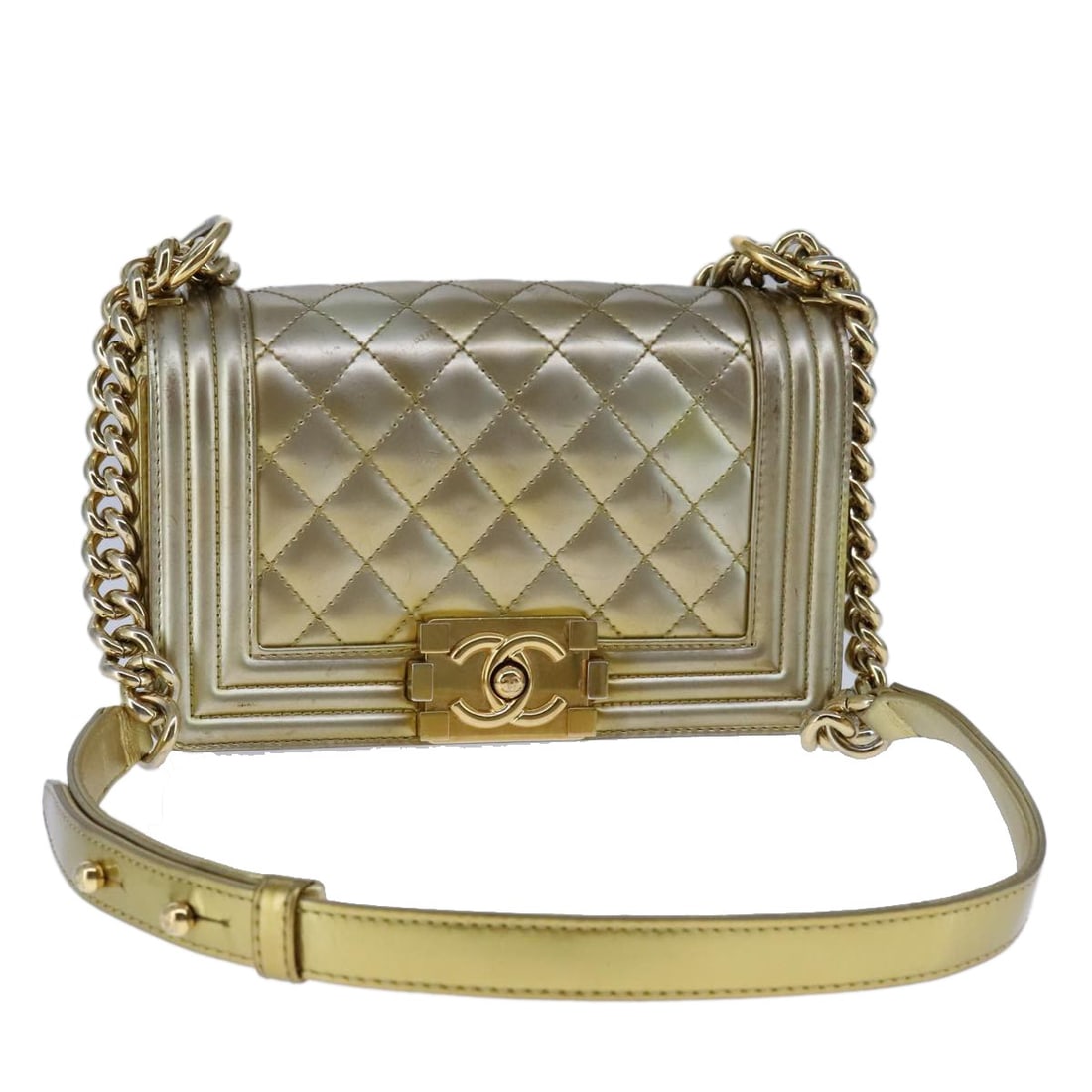 CHANEL Boy Chanel Matelasse Patent Leather Shoulder Bag Gold CC: CHANEL Boy Chanel Matelasse Patent Leather Shoulder Bag Gold CC Chanel Matelasse Boy Chanel shoulder bag in gold patent leather. This women's shoulder bag is made in France and includes only the item 
