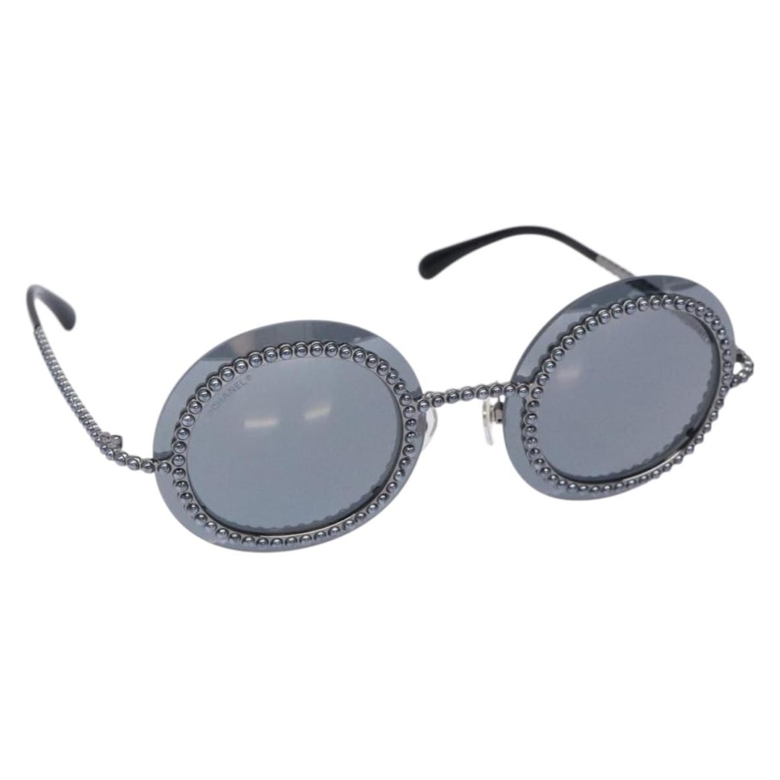 CHANEL black plastic sunglasses with case made in Italy: CHANEL black plastic sunglasses with case made in Italy Authentic CHANEL women's sunglasses in black plastic. Includes a sunglass case. Condition is rated A, with the exterior noted as being in excell