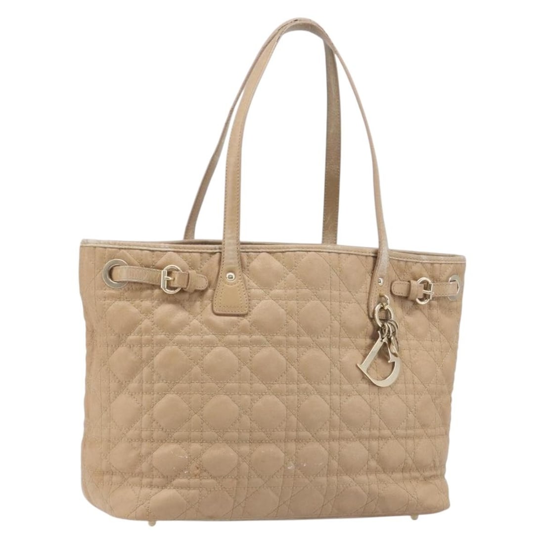 Christian Dior Lady Dior beige canvas tote bag gold tone hardware: Christian Dior Lady Dior beige canvas tote bag gold tone hardware Christian Dior Lady Dior Cannage tote bag in beige canvas with gold tone accents. Made in Italy, this women's tote features a structur