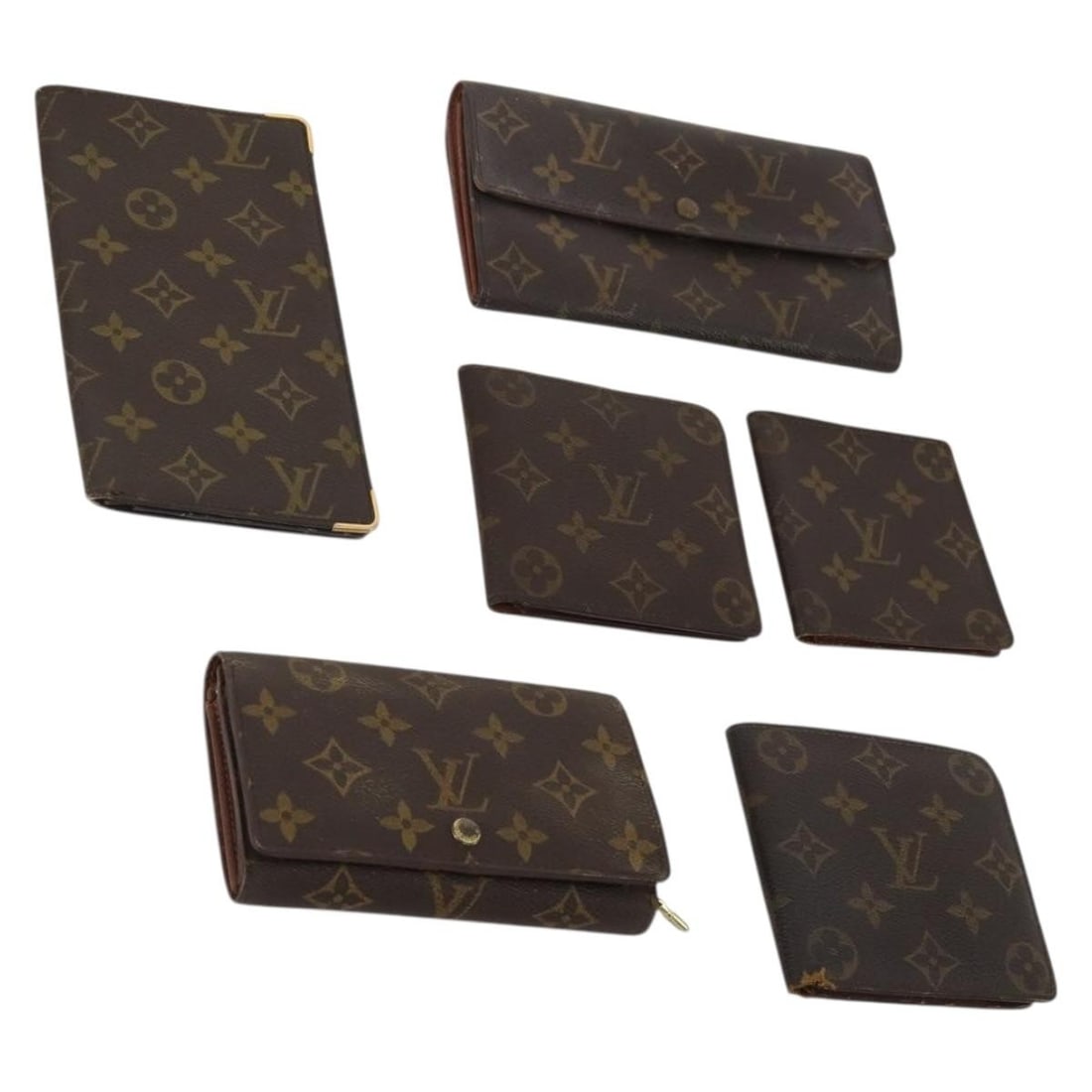 Set of 6 Louis Vuitton Monogram Canvas Wallets for Women: Set of 6 Louis Vuitton Monogram Canvas Wallets for Women Louis Vuitton monogram canvas wallet set for women, made in France. This heavily used set shows significant wear throughout, including shape lo