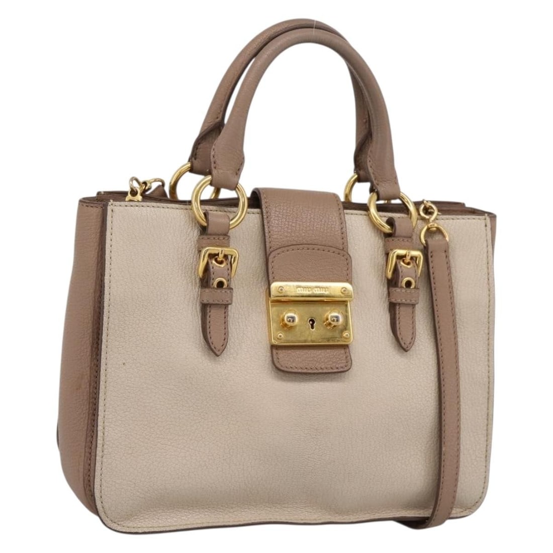 Miu Miu Beige Leather 2way Handbag with Shoulder Strap: Miu Miu Beige Leather 2way Handbag with Shoulder Strap Miu Miu 2-way handbag in beige leather with gold-tone accents. Made in Italy, this women's bag includes a shoulder strap for hand or shoulder car