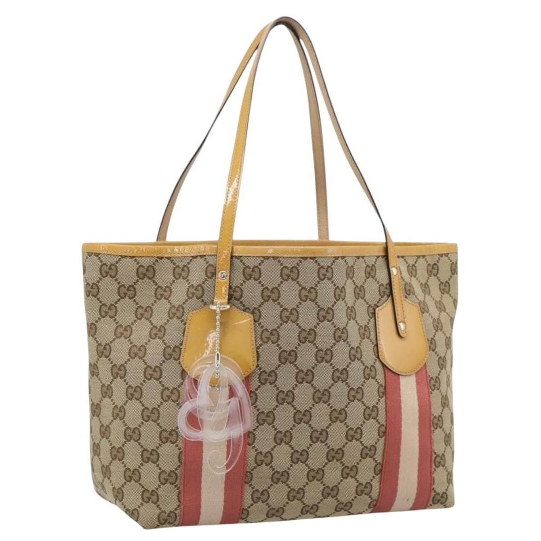 Gucci 211971 GG Canvas Tote Bag Beige Gold Charm: Gucci 211971 GG Canvas Tote Bag Beige Gold Charm Authentic Gucci Sherry Line tote bag in beige and gold GG canvas with charm accessory. This women's tote is made in Italy and shows heavy use, includin