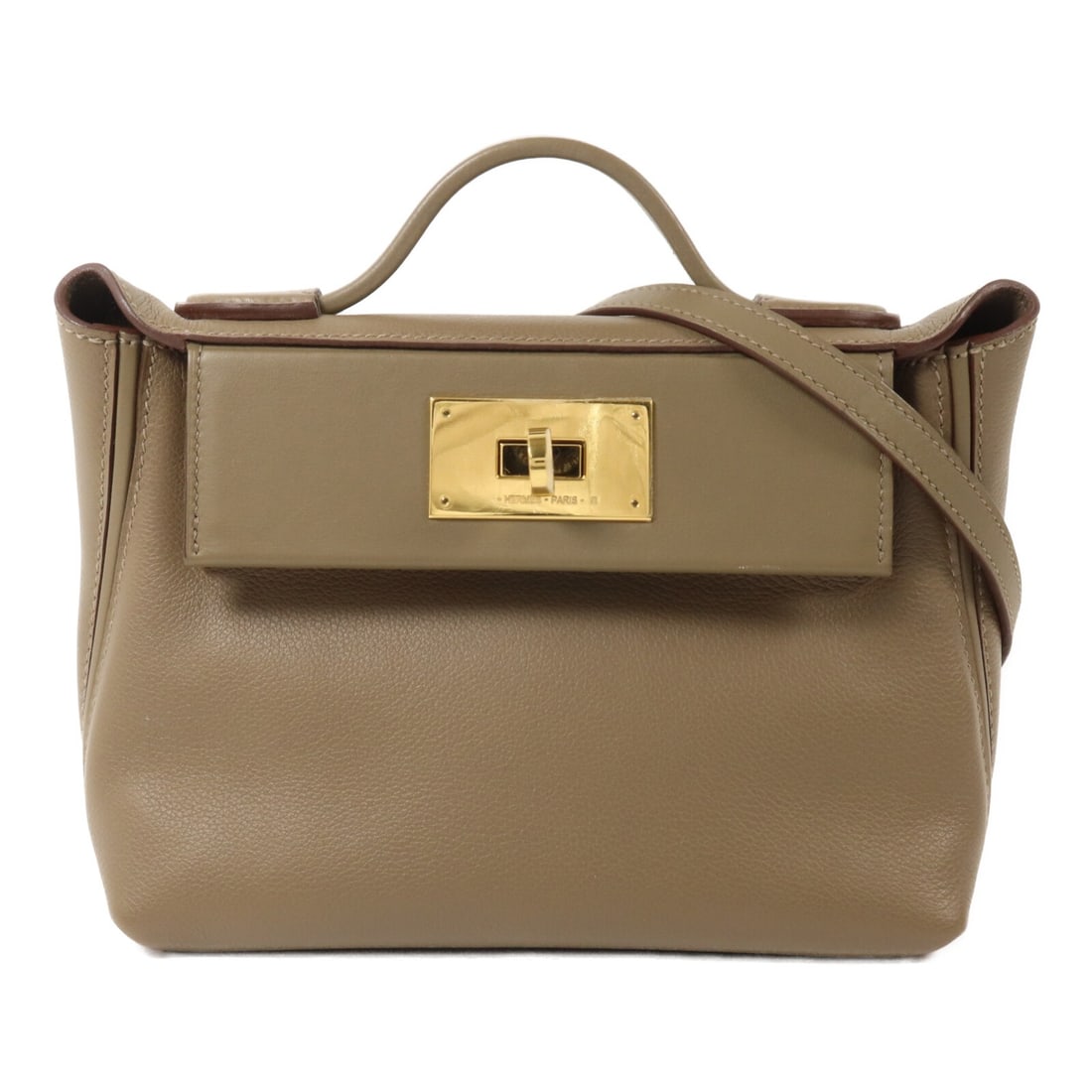 Hermes 24 24 Mini 2way Shoulder Bag Etoupe Evercolor Swift Leather: Hermes 24 24 Mini 2way Shoulder Bag Etoupe Evercolor Swift Leather Hermes 24/24 Mini 2-way shoulder bag in Etoupe Evercolor and Veau Swift leather. This women's bag features a structured silhouette, t
