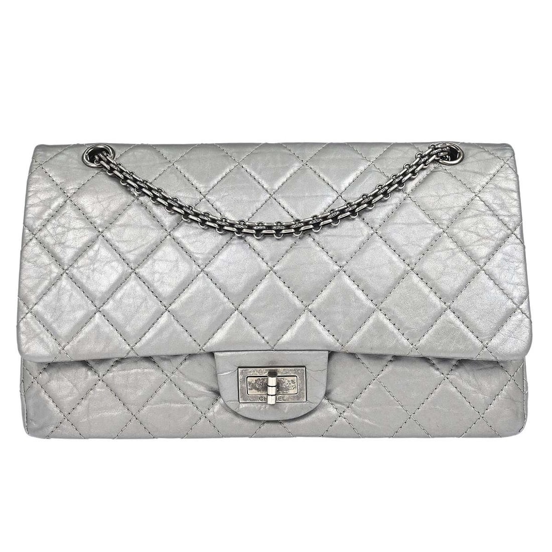 CHANEL Classic Double Flap Jumbo 2.55 Silver Calfskin Shoulder Bag: CHANEL Classic Double Flap Jumbo 2.55 Silver Calfskin Shoulder Bag Chanel 2.55 Jumbo Classic Double Flap shoulder bag in silver calfskin with a turn lock closure and shoulder strap. The bag features o