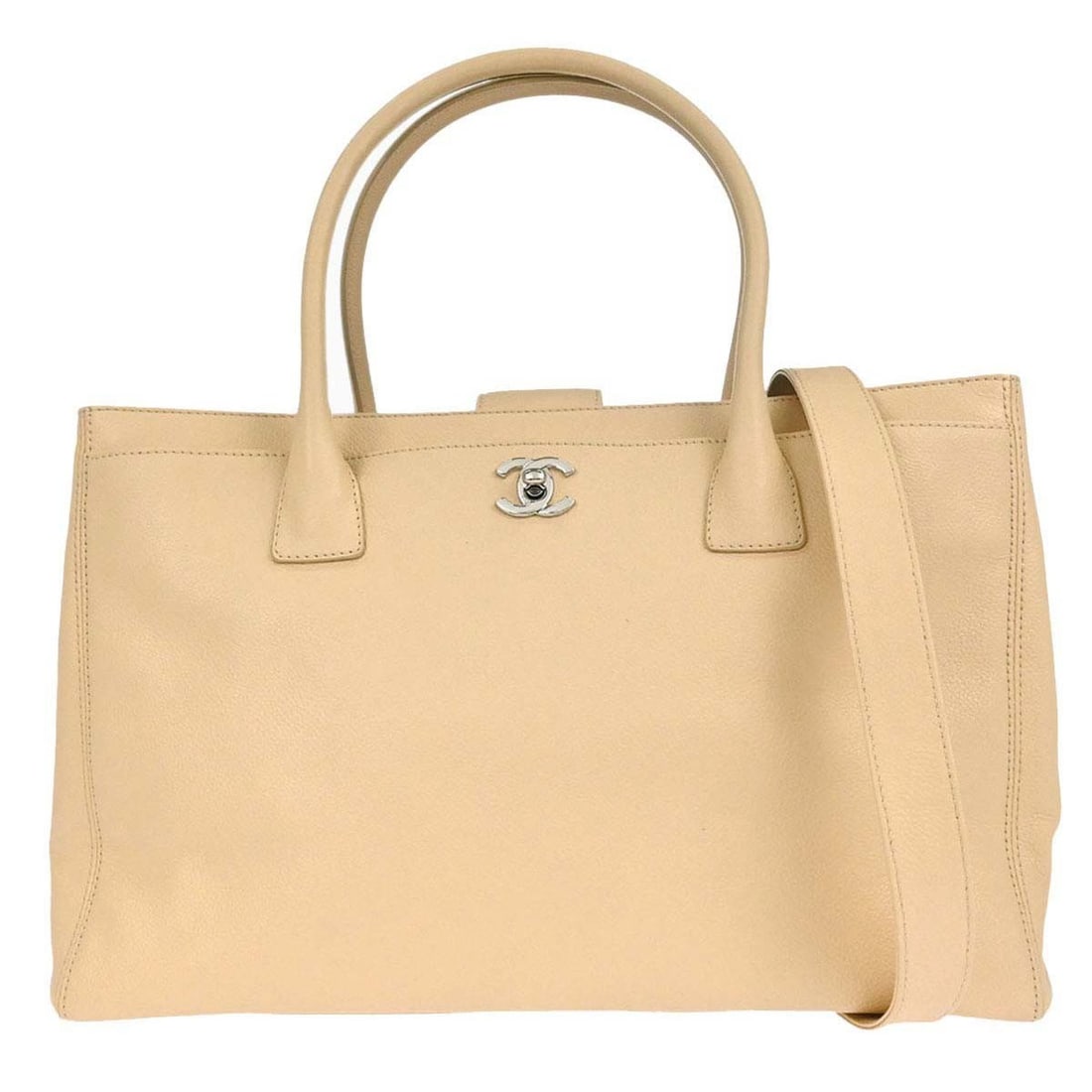 CHANEL Cerf Executive Beige Calfskin 2way Tote Bag: CHANEL Cerf Executive Beige Calfskin 2way Tote Bag Chanel Executive Cerf 2-way tote bag in beige calfskin with a turn-lock closure and double handles. This medium tote features logo accents, multiple 