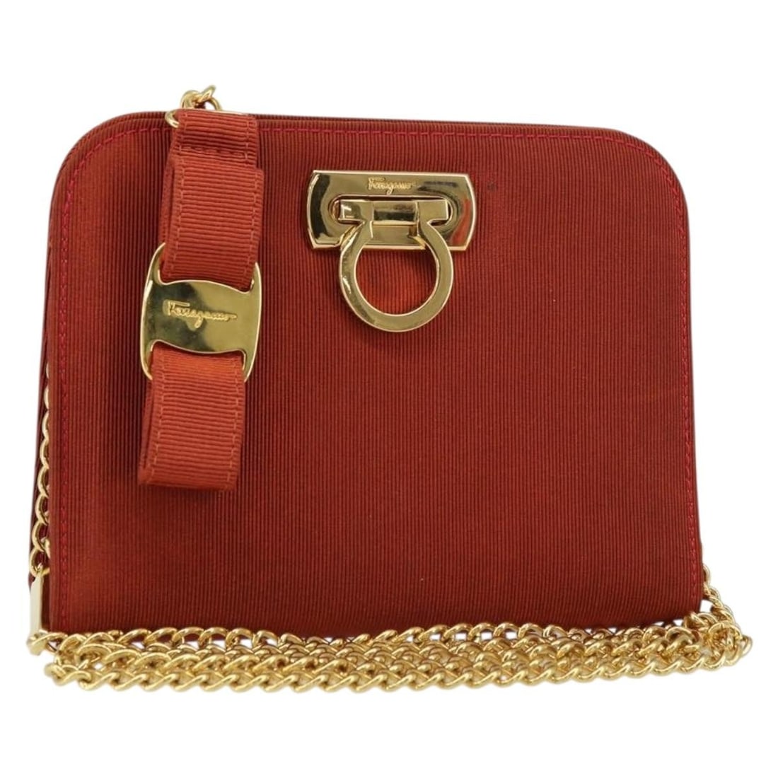 Salvatore Ferragamo Red Nylon Shoulder Bag with Chain Strap: Salvatore Ferragamo Red Nylon Shoulder Bag with Chain Strap Salvatore Ferragamo shoulder bag in red nylon with gold-tone accents, made in Italy. This women's bag features a chain shoulder style and in