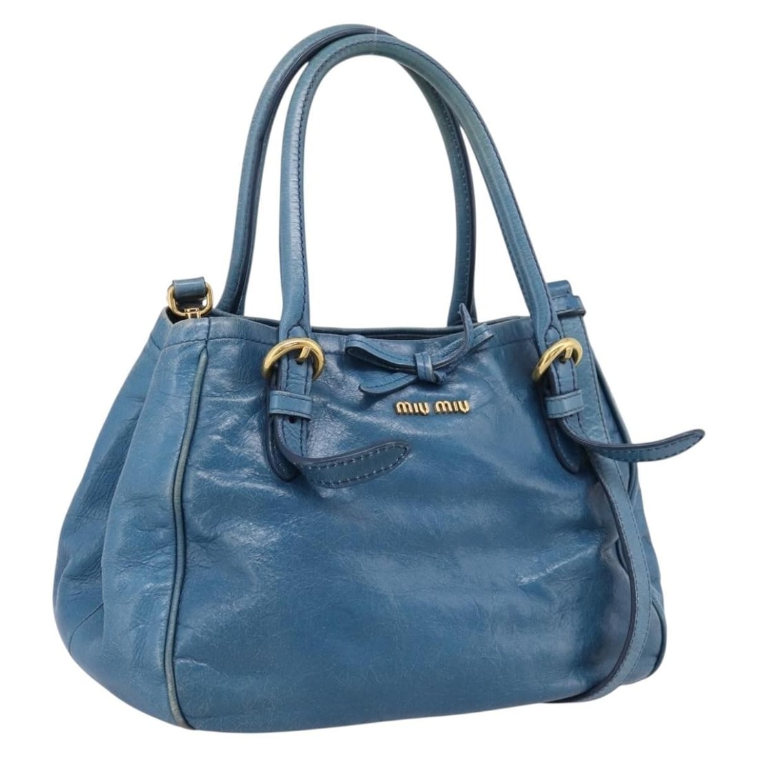 Miu Miu Blue Leather 2 Way Handbag with Strap and Dust Bag: Miu Miu Blue Leather 2 Way Handbag with Strap and Dust Bag Miu Miu 2-way handbag in blue leather with gold-tone accents. This women's bag includes a top handle and a detachable shoulder strap, along w