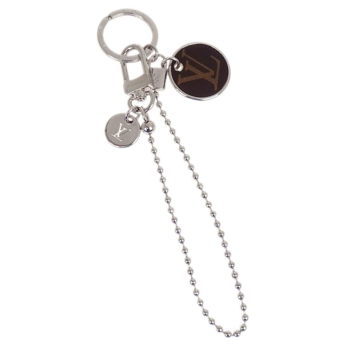 Louis Vuitton M63628 Porte Cles Chaine Silver Plated Key Chain Charm: Louis Vuitton M63628 Porte Cles Chaine Silver Plated Key Chain Charm Louis Vuitton Porte Cles Chaine bag charm key chain in a silver colorway with a logo theme. It is described as vintage and in very 