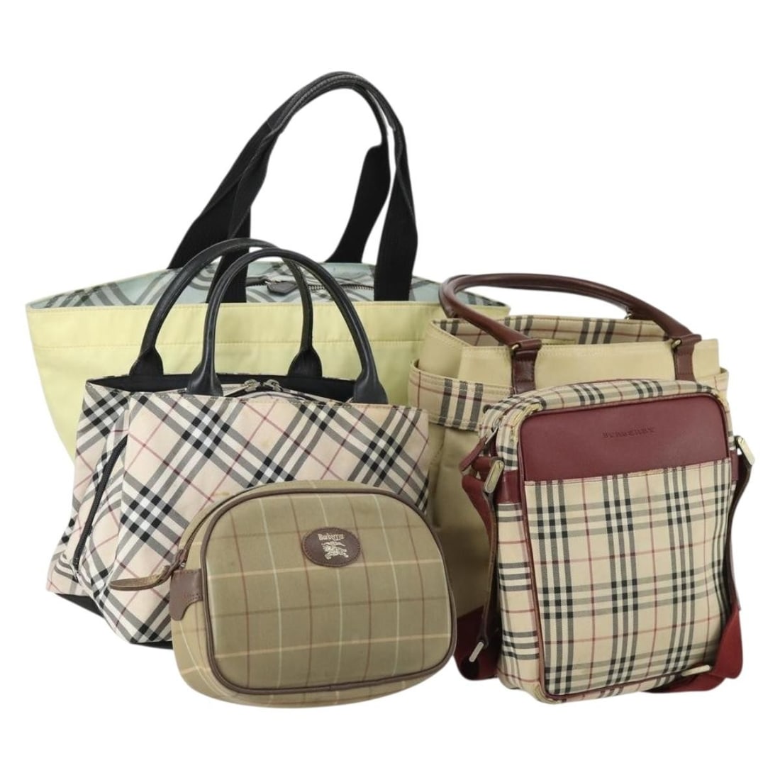 Set of 5 Burberry Yellow Beige Nylon Nova Check Shoulder Bags: Set of 5 Burberry Yellow Beige Nylon Nova Check Shoulder Bags This Burberry Nova Check shoulder bag set features five pieces crafted from nylon canvas in yellow and beige tones. The set includes