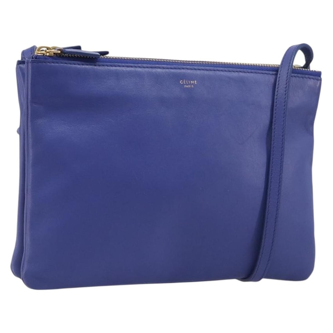 CELINE Trio Leather Shoulder Bag Blue Gold Tone Italy: CELINE Trio Leather Shoulder Bag Blue Gold Tone Italy A CELINE Trio shoulder bag in blue leather with gold-tone accents, made in Italy. This women's bag has a slim profile and an adjustable shoulder s