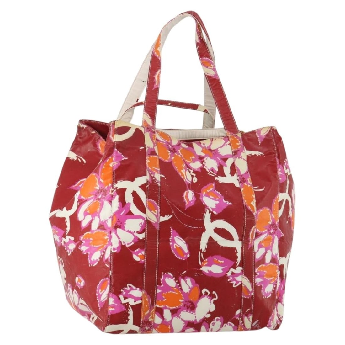 CHANEL Red PVC Leather Tote Bag High Summer Line: CHANEL Red PVC Leather Tote Bag High Summer Line Chanel High Summer Line tote bag in red PVC leather with CC detailing. Made in Italy, this women's tote has a spacious silhouette and includes only the