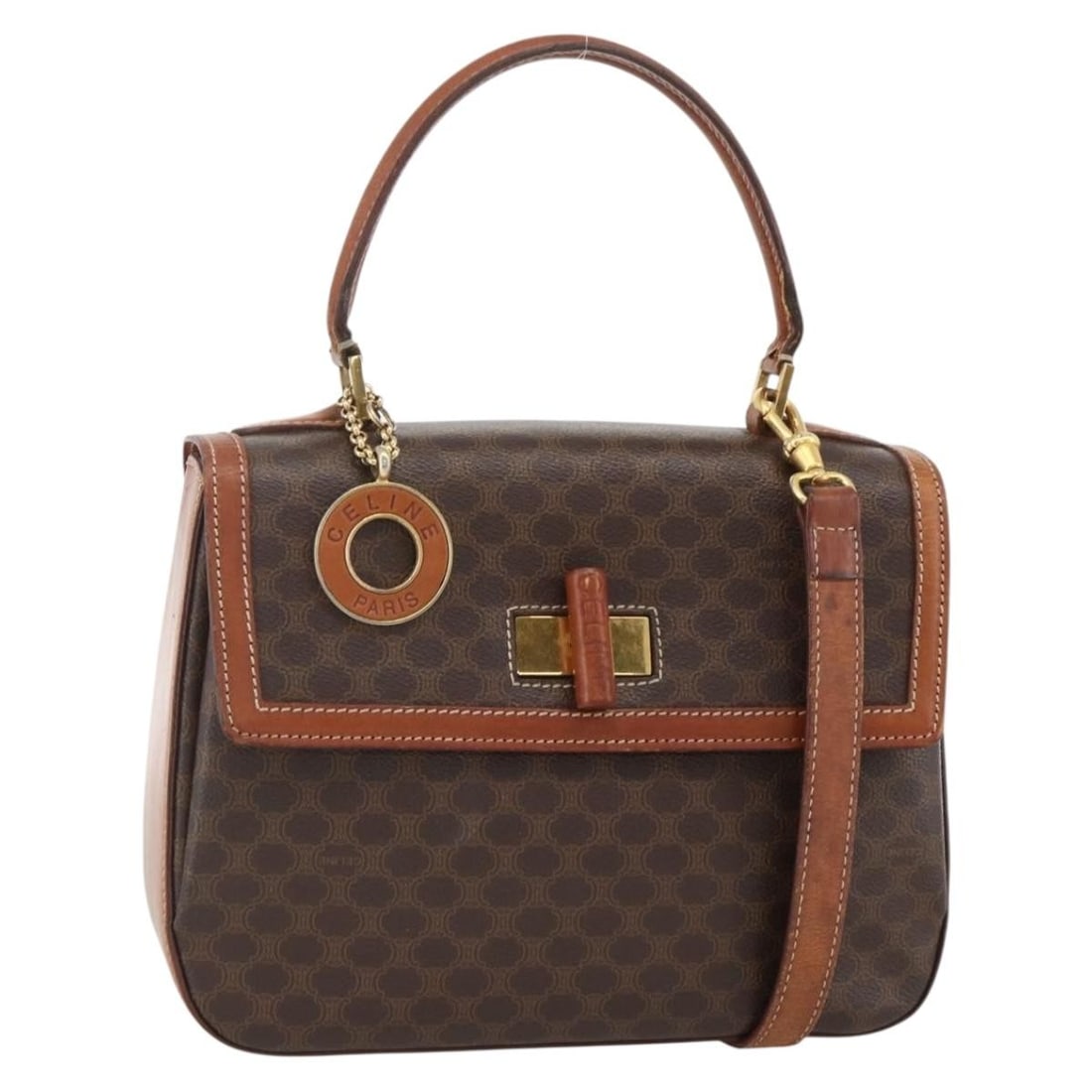 CELINE Macadam 2way Hand Bag Brown PVC Leather Canvas Strap: CELINE Macadam 2way Hand Bag Brown PVC Leather Canvas Strap Celine Macadam canvas 2-way hand bag crafted in PVC leather with a brown and gold colorway. Made in Italy, this women's bag includes a shoul