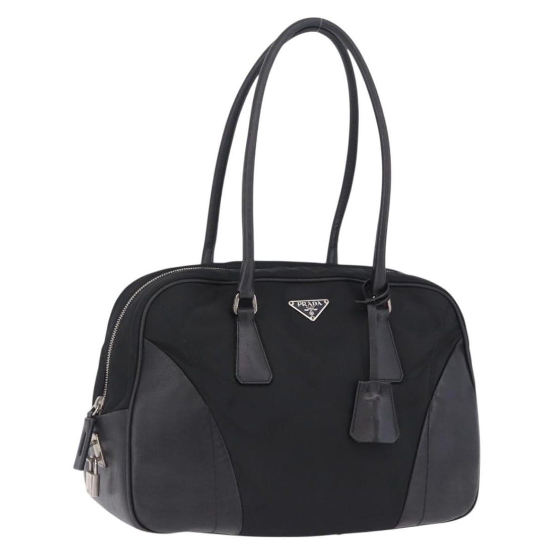PRADA Black Nylon Tote Bag with Padlock Keys and Clochette: PRADA Black Nylon Tote Bag with Padlock Keys and Clochette Authentic Prada tote bag in black nylon with silver-tone accents. This women's bag includes a padlock, two keys, and a clochette. Made in Ita