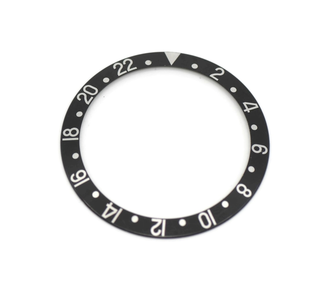 Rolex 16710 GMT-Master bezel insert: Rolex 16710 GMT-Master bezel insert Pre-owned Rolex GMT-Master insert 16710, made in Switzerland and intended for compatibility with Rolex GMT-Master models. Specifications Brand: Rolex Type: Insert C