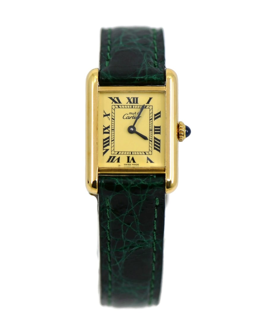 Cartier Tank Must manual wristwatch gold plated sterling silver: Cartier Tank Must manual wristwatch gold plated sterling silver Cartier Tank Must wristwatch with a classic analog display and manual mechanical movement. This pre-owned unisex watch features a green 