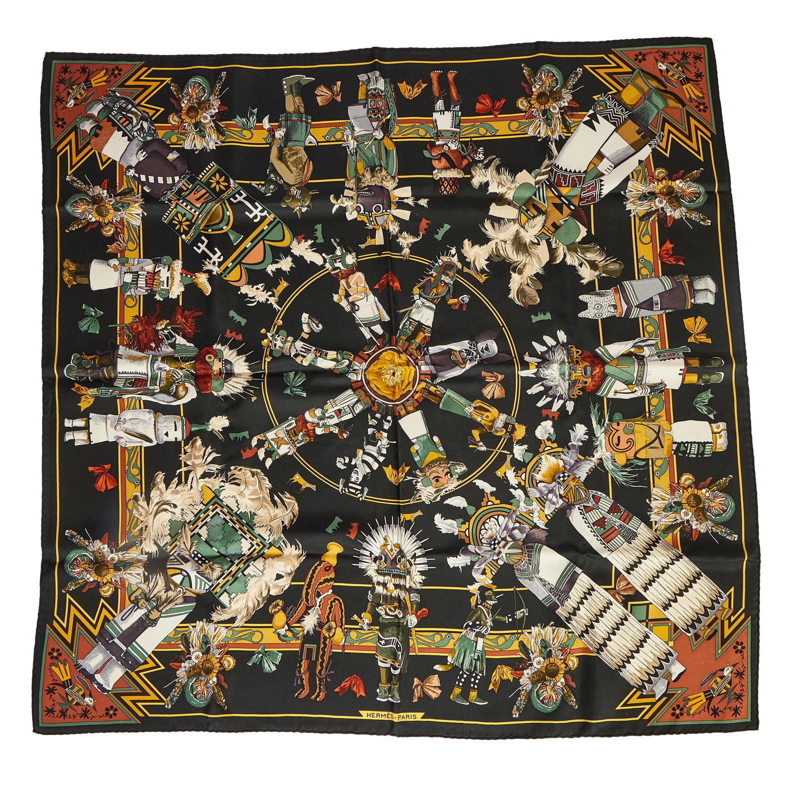 Hermes Kachinas Silk Scarf by Kermit Oliver 35 in Black Brown: Hermes Kachinas Silk Scarf by Kermit Oliver 35 in Black Brown Elevate your style with the exquisite Hermes Kachinas silk scarf, designed by the renowned artist Kermit Oliver. This luxurious scarf feat