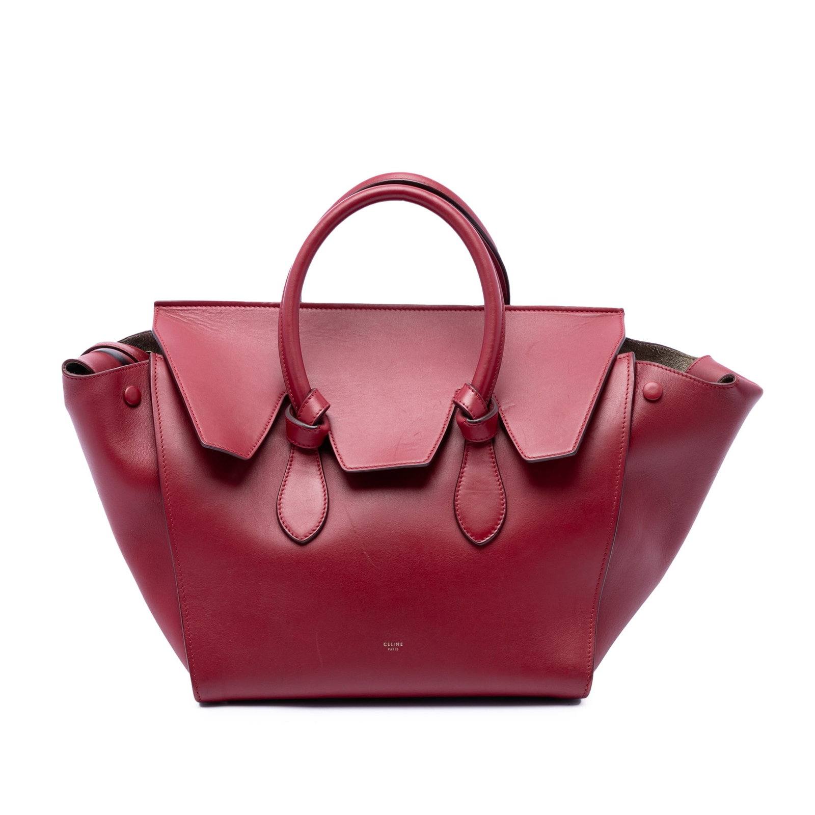 Celine Tie Tote Small Red Leather Handbag: Celine Tie Tote Small Red Leather Handbag A Celine Small Tie Tote crafted in red leather with rolled leather handles, a top flap, and an interior with zip and slip pockets. Made in Italy, this bag sho