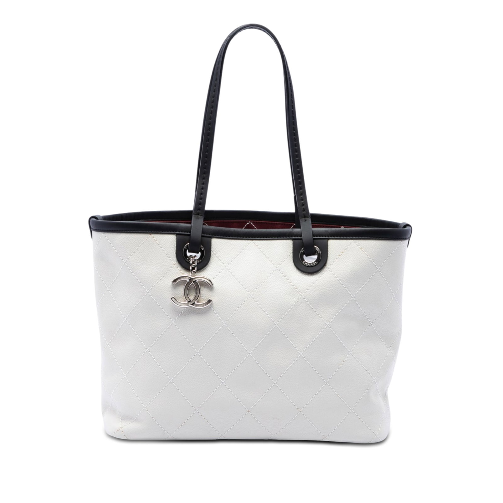 Chanel Shopping Fever Tote in White Quilted Caviar Leather: Chanel Shopping Fever Tote in White Quilted Caviar Leather This Chanel Shopping Fever tote is crafted in white quilted caviar leather with flat leather straps, a top zip closure, and an interior with 