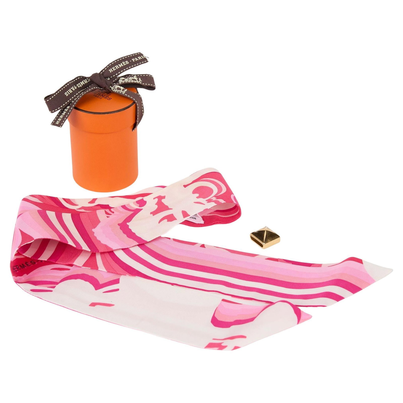 Hermes Bridges De Gala Shadow Twilly 100% Silk Rose White Fuchsia: Hermes Bridges De Gala Shadow Twilly 100% Silk Rose White Fuchsia Introducing the exquisite Hermes Bridges De Gala Shadow Twilly, a luxurious accessory crafted from 100% silk. This twilly features a v