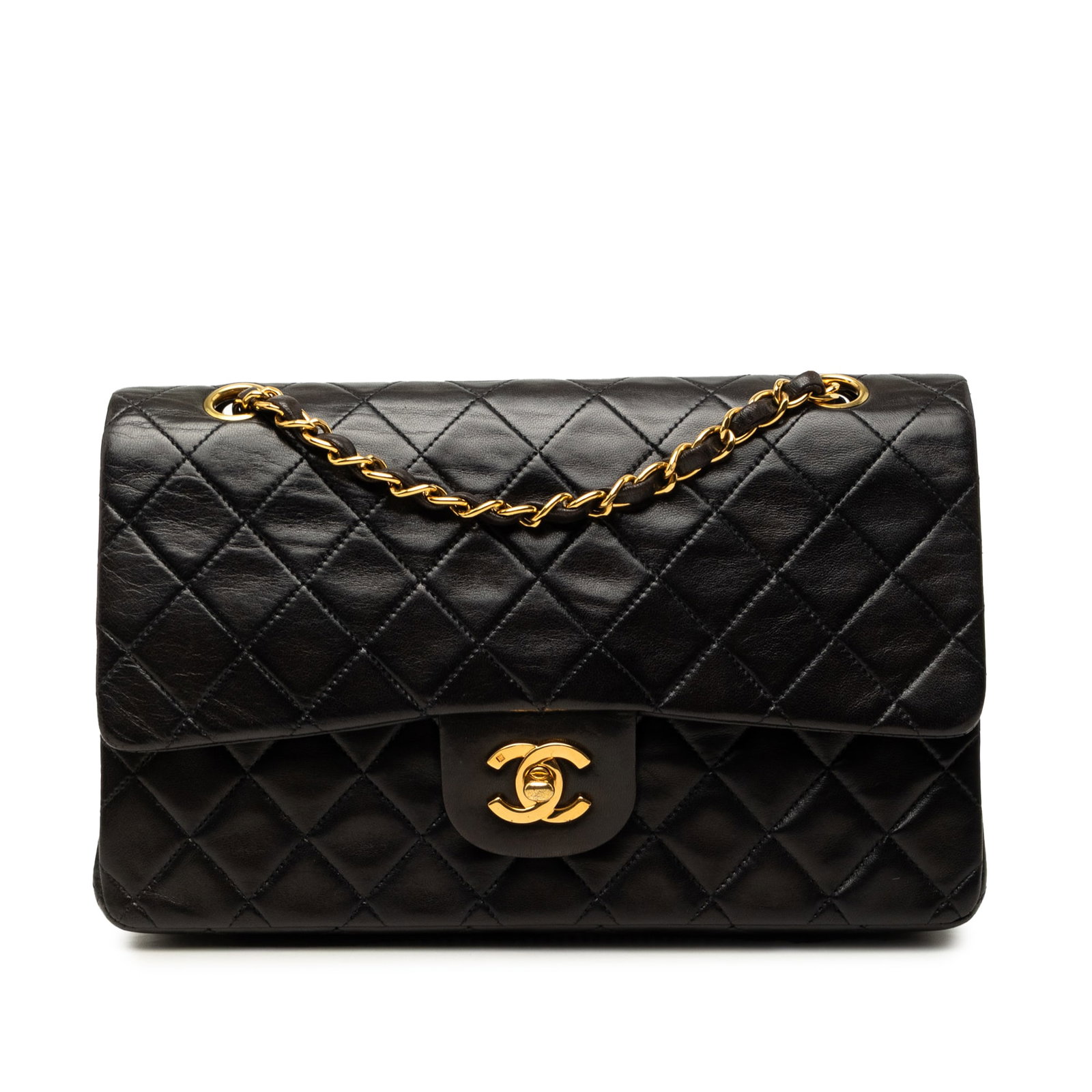 Chanel Medium Classic Double Flap Shoulder Bag Black Lambskin: Chanel Medium Classic Double Flap Shoulder Bag Black Lambskin A Chanel Medium Classic Lambskin Double Flap shoulder bag in black quilted lambskin. This iconic design features a back slip pocket, leath