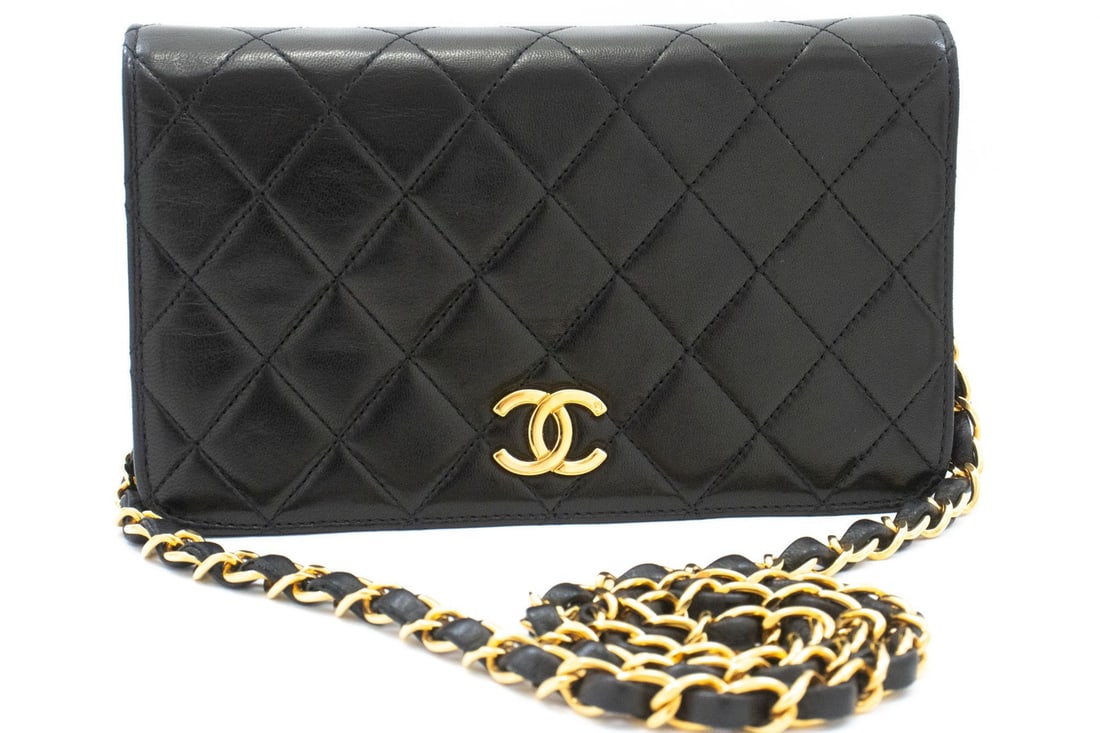 Chanel Vintage Full Flap Black Lambskin Bag: Chanel Vintage Full Flap Black Lambskin Bag A Chanel Vintage Full Flap bag in black quilted lambskin with a classic, compact silhouette. Made in France, this piece is in good condition with light wear