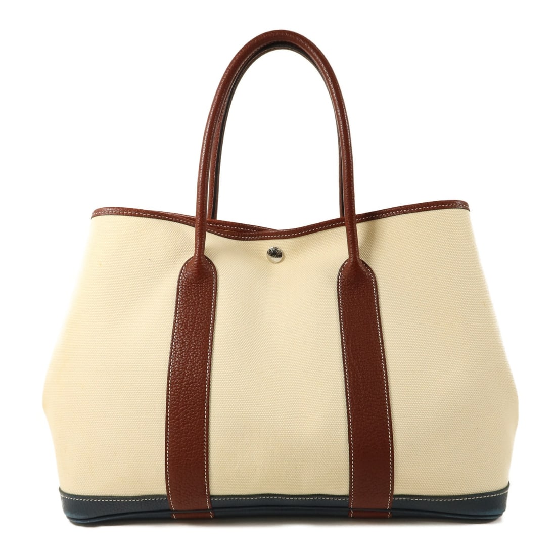 Hermes Garden Party PM Canvas Tote Bag Blanc Beige PHW: Hermes Garden Party PM Canvas Tote Bag Blanc Beige PHW Hermes Garden Party PM tote bag in canvas with a Blanc and beige color combination. This women's tote is made in France and includes storage bags