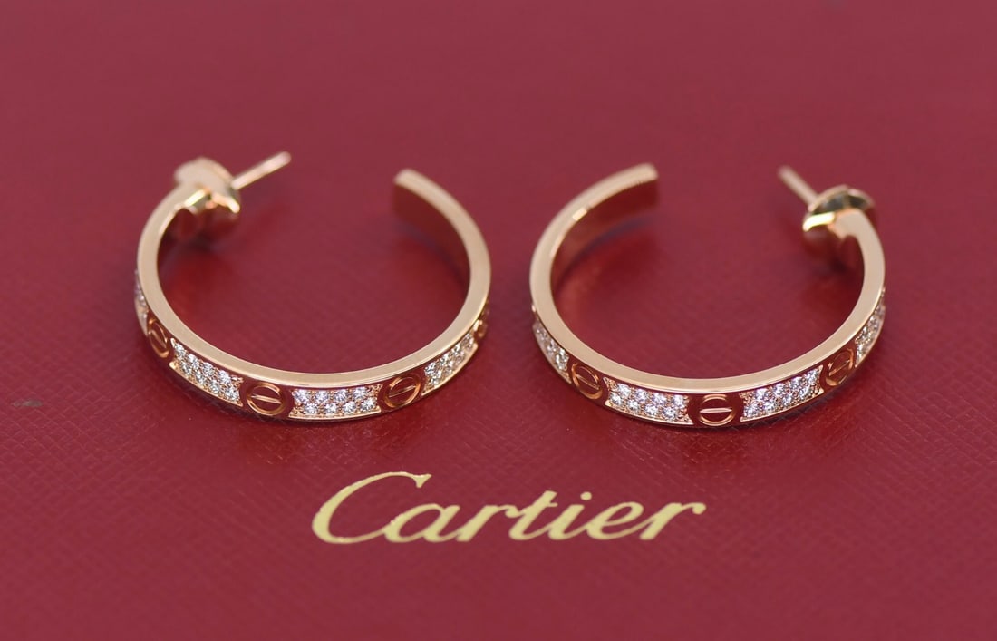 Cartier Love 18K Rose Gold Pave Diamond Hoop Earrings: Cartier Love 18K Rose Gold Pave Diamond Hoop Earrings Cartier Love hoop earrings crafted in 18k rose gold with pave-set diamonds. This pre-owned pair includes the original box and a recent Cartier ser