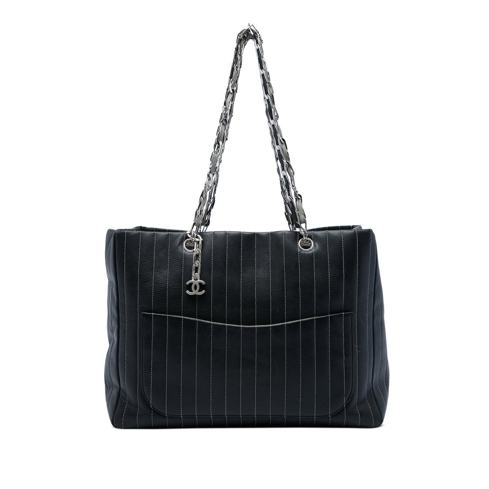 Chanel Mademoiselle Vertical Quilted Large Lambskin Shoulder Tote: Chanel Mademoiselle Vertical Quilted Large Lambskin Shoulder Tote A Chanel Mademoiselle tote crafted in black lambskin leather with vertical quilting. This shoulder bag features leather-woven chain li