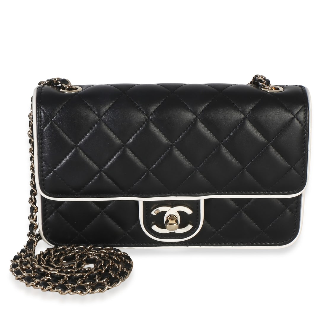 Chanel Wallet On Chain flap bag in black white quilted lambskin: Chanel Wallet On Chain flap bag in black white quilted lambskin Pre-owned Chanel Wallet On Chain in black and white quilted lambskin with a resin CC flap and turnlock closure. This unisex shoulder bag