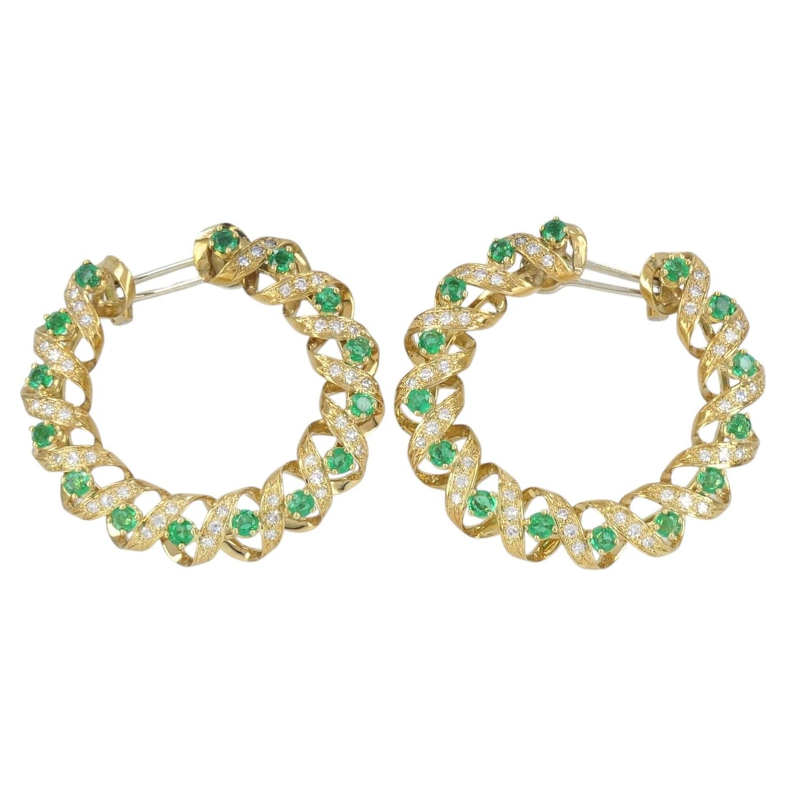 Asprey 18k Yellow Gold Hoop Earrings with Diamonds and Emeralds: Asprey 18k Yellow Gold Hoop Earrings with Diamonds and Emeralds Vintage Asprey & Co. circular earrings crafted in 18k yellow gold with diamonds and emeralds. The design features a sculptural twisted r