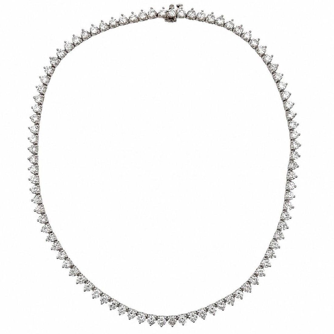 Diamond Tennis Necklace in 14K White Gold 18 Ct 16 In: Diamond Tennis Necklace in 14K White Gold 18 Ct 16 In Pre-owned 14K white gold tennis necklace set with 89 diamonds. The diamonds have an approximate total weight of 18.00 ct and are described as F-G 