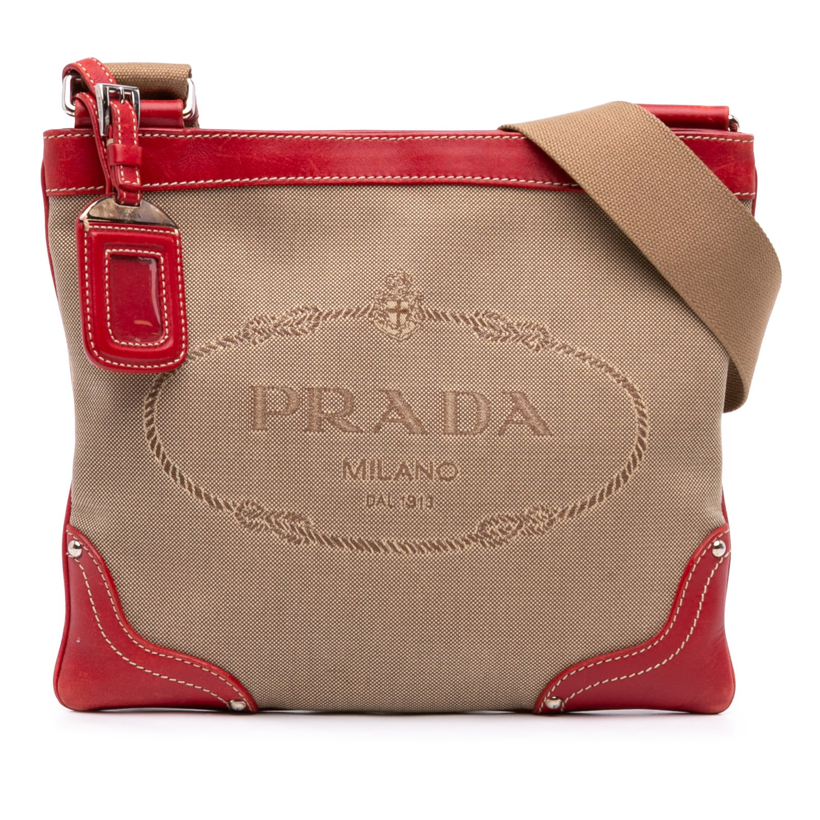 Prada Canapa Logo Canvas Crossbody Bag Beige: Prada Canapa Logo Canvas Crossbody Bag Beige Prada Canvas Canapa Logo Crossbody bag in beige fabric with leather trim. It features an adjustable flat strap, top zip closure, and an interior zip pocket