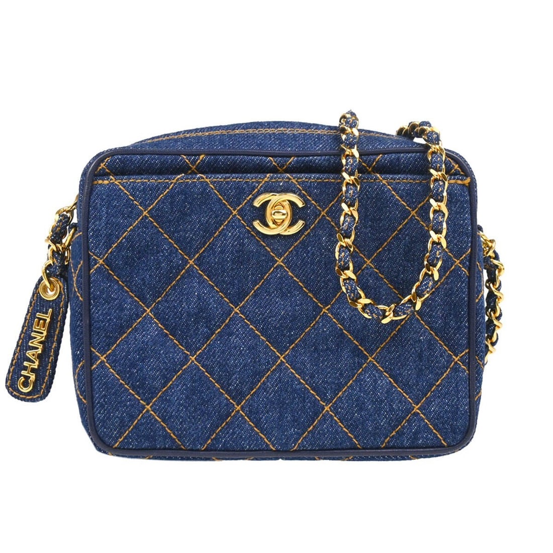 CHANEL Quilted Small Shoulder Bag in Indigo Denim: CHANEL Quilted Small Shoulder Bag in Indigo Denim Chanel shoulder bag in indigo denim canvas with a matelasse quilted design. This small bag features a zip closure, chain crossbody strap, leather lini