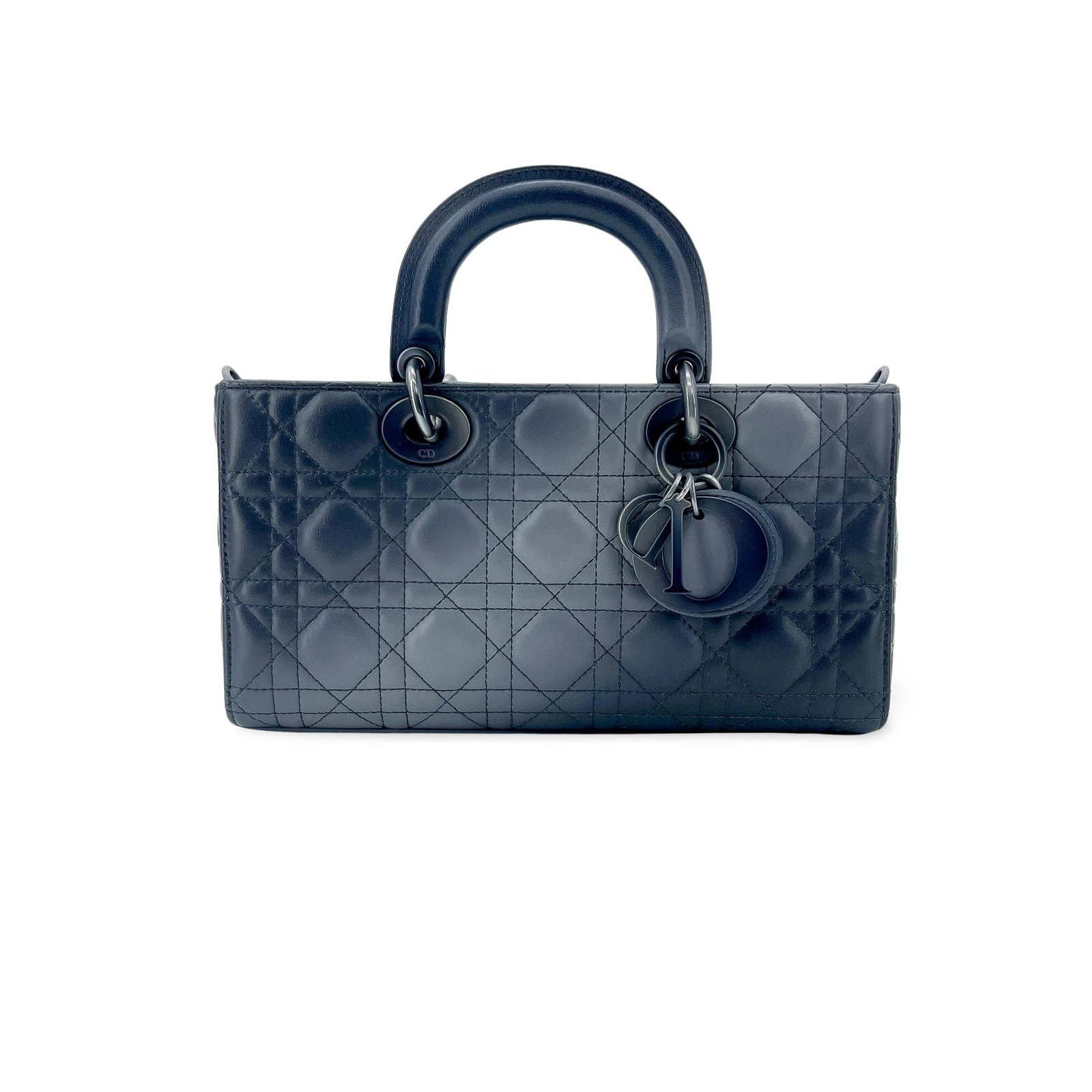 Christian Dior Lady D-Joy navy leather handbag: Christian Dior Lady D-Joy navy leather handbag The Christian Dior Lady D-Joy is a structured handbag in navy leather with the house's signature Cannage quilted design. Made in Italy, it presents in ve