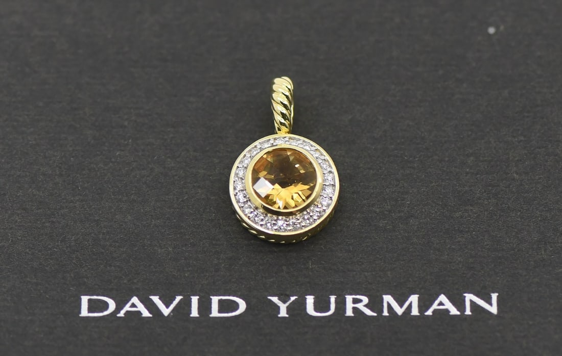 David Yurman 18K Yellow Gold Citrine Diamond Pendant 22x13mm: David Yurman 18K Yellow Gold Citrine Diamond Pendant 22x13mm David Yurman pendant crafted in 18k yellow gold and set with citrine and diamond accents. This pre-owned piece is made in the United States