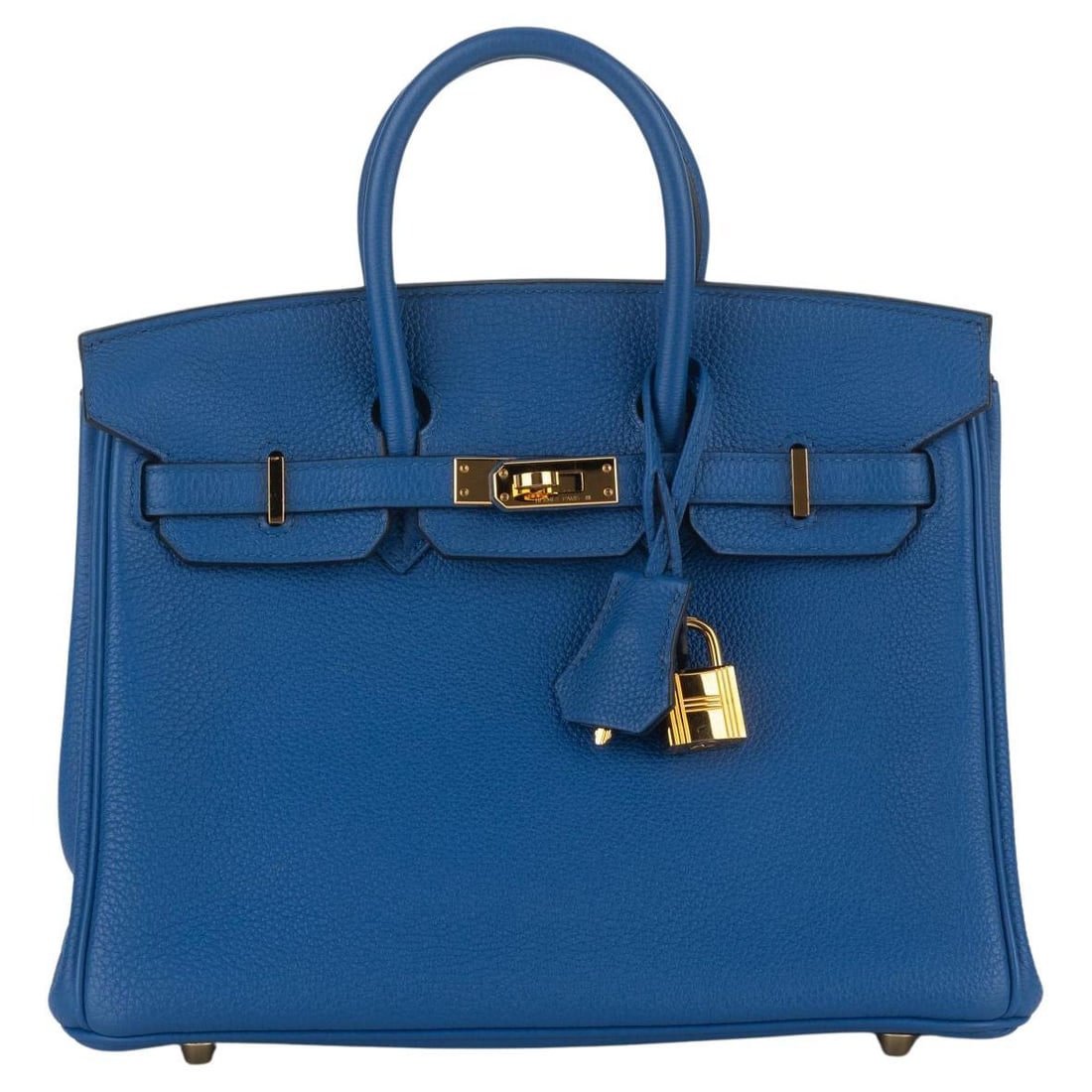 Hermes Birkin 25 handbag in Blue Electrique Togo leather: Hermes Birkin 25 handbag in Blue Electrique Togo leather Hermes Birkin 25 handbag in Blue Electrique Togo leather with tonal stitching and gold hardware. This structured design features a front flap, 