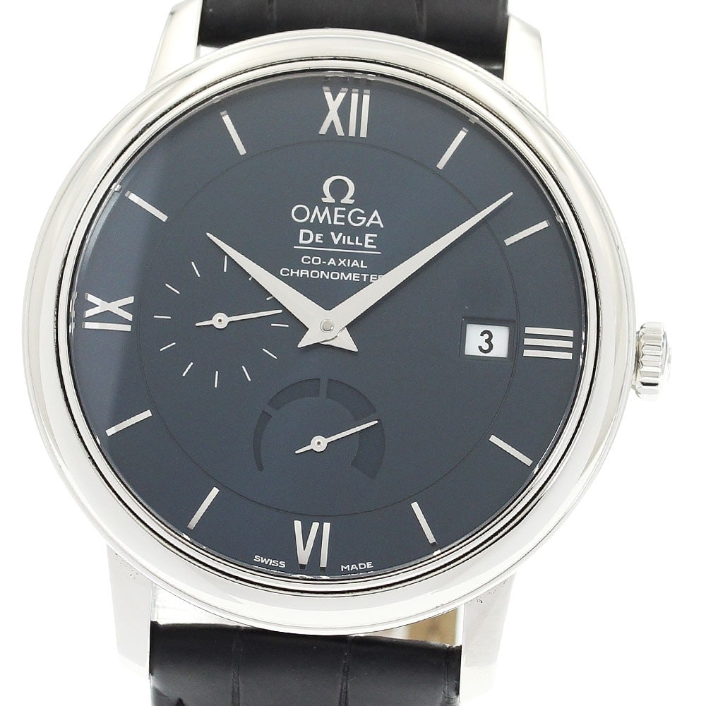 OMEGA De Ville Prestige automatic wristwatch ref 424.13.40.21.03.001: OMEGA De Ville Prestige automatic wristwatch ref 424.13.40.21.03.001 OMEGA De Ville Prestige automatic wristwatch with a navy dial and stainless steel case. This men's watch features date, small secon
