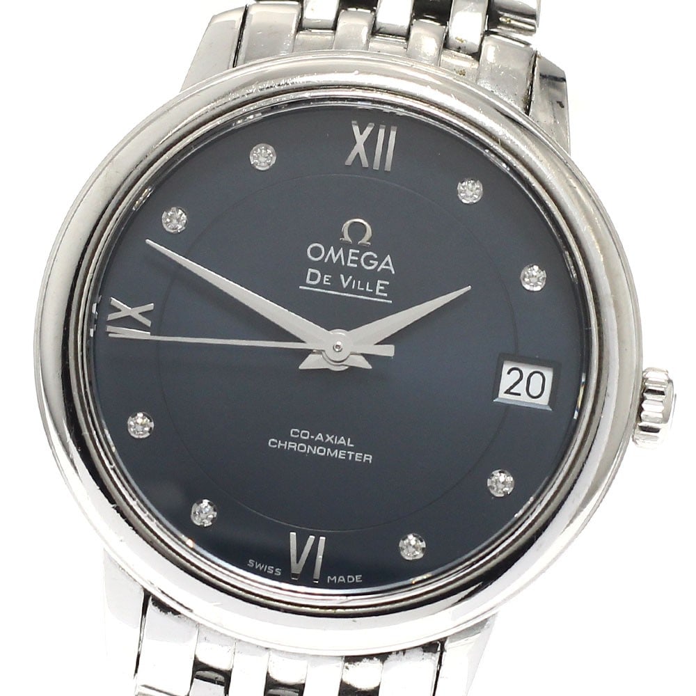 Omega De Ville Prestige women's automatic watch ref 424.10.33.20.53.001: Omega De Ville Prestige women's automatic watch ref 424.10.33.20.53.001 Omega De Ville Prestige women's wristwatch with an automatic Co-Axial movement, navy dial, date display, and stainless steel cas