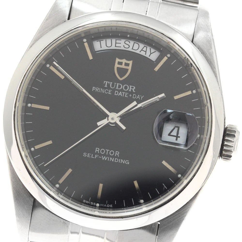 TUDOR Prince Date-Day Ref 76200 Automatic Mens Stainless Steel Watch: TUDOR Prince Date-Day Ref 76200 Automatic Mens Stainless Steel Watch TUDOR Prince Date-Day automatic men's wristwatch with a black dial and stainless steel case and bracelet. This watch features a day