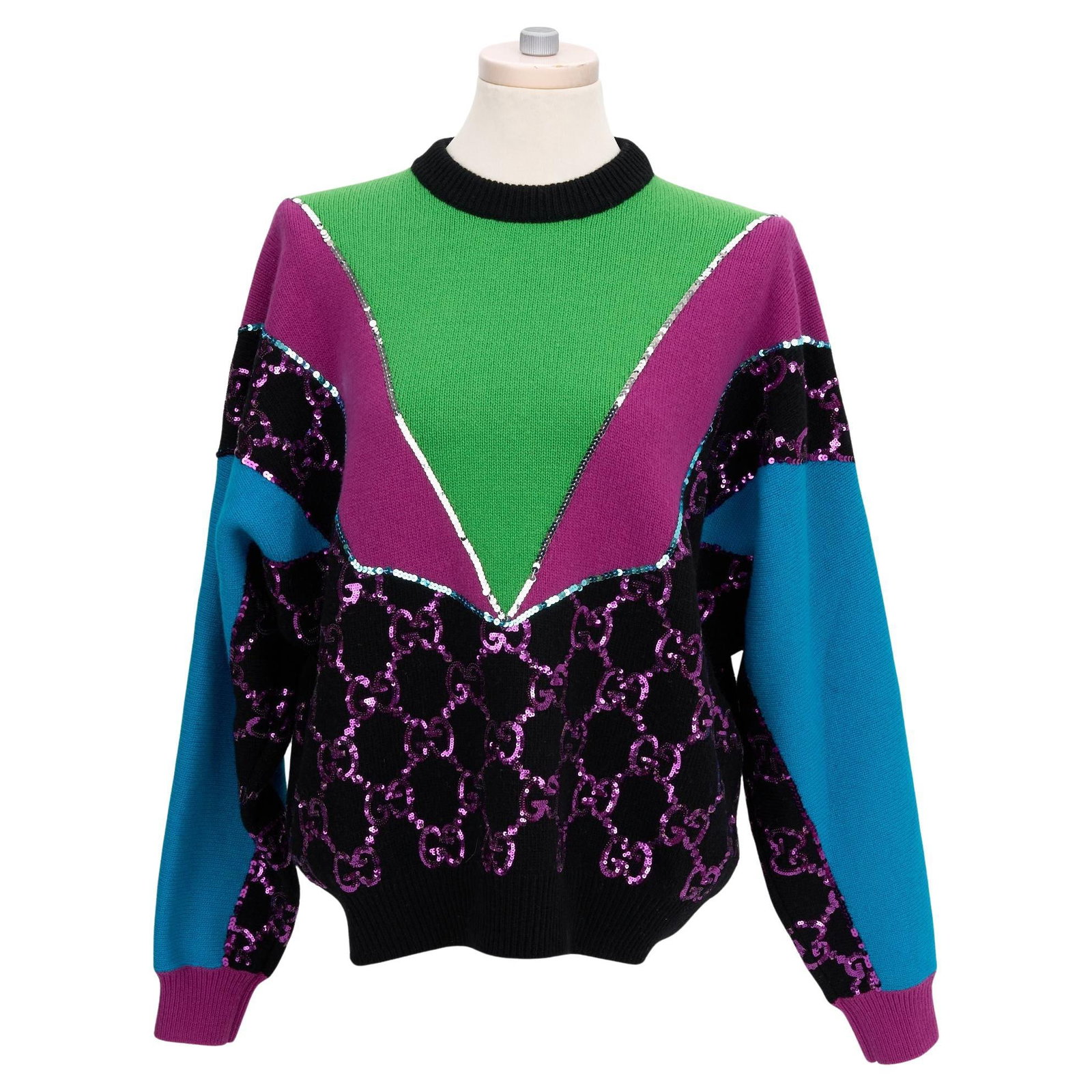 Gucci Wool Sweater with Multicolor Sequin Logo Italy: Gucci Wool Sweater with Multicolor Sequin Logo Italy Elevate your wardrobe with this striking Gucci Sequin Embellished Wool Sweater, crafted in Italy. This unique piece is adorned with vibrant multi-c
