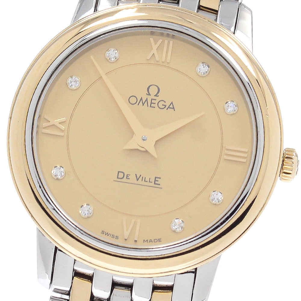 OMEGA De Ville Prestige Ladies Quartz Watch Ref 424.20.27.60.58.001: OMEGA De Ville Prestige Ladies Quartz Watch Ref 424.20.27.60.58.001 Omega De Ville Prestige ladies wristwatch with a quartz movement and gold dial. This watch-only piece features an 8-diamond design a