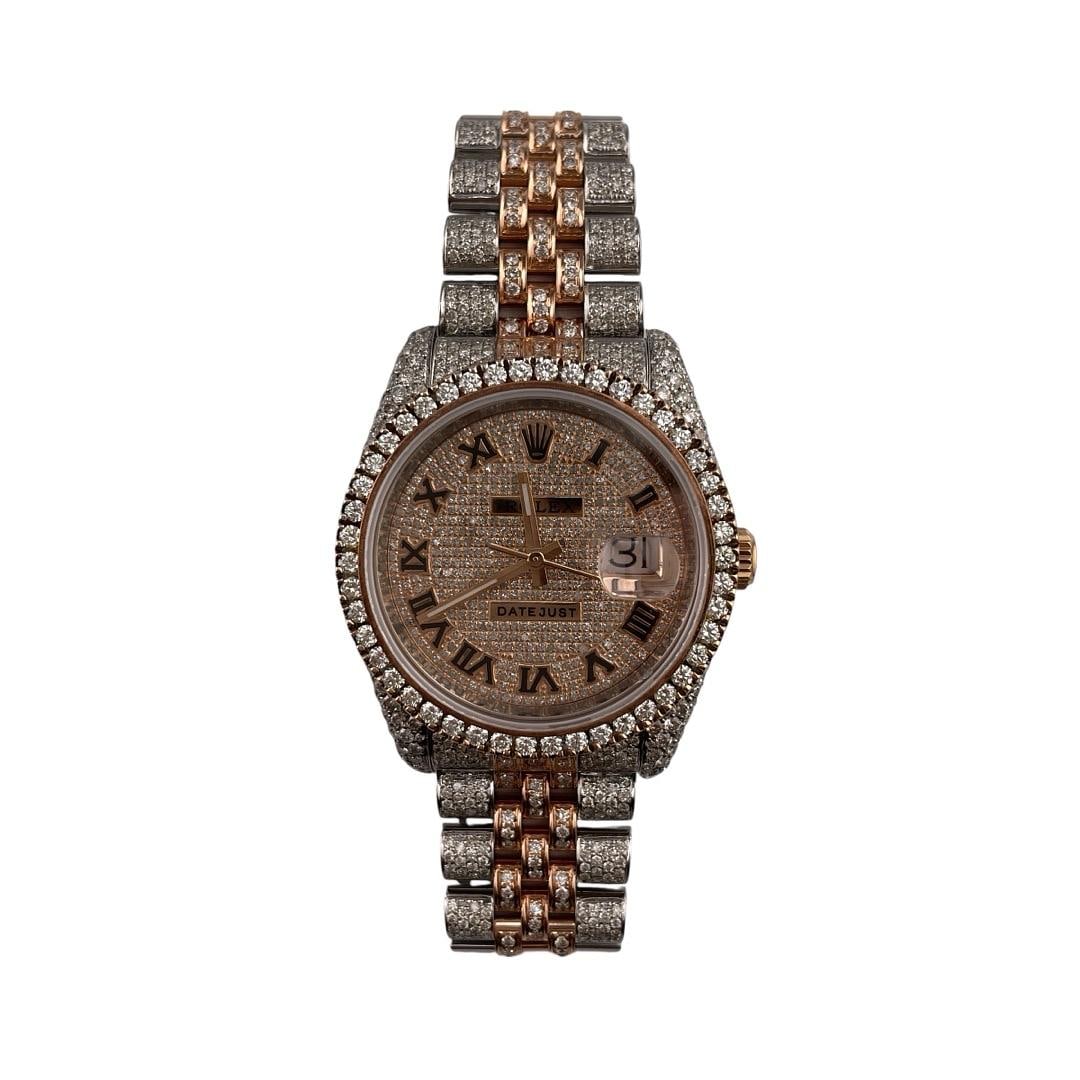 Rolex Datejust 116231 mens watch Jubilee bracelet aftermarket diamond bezel: Rolex Datejust 116231 mens watch Jubilee bracelet aftermarket diamond bezel This Rolex Datejust is a men's luxury watch, featuring a diamond Roman numeral dial and a diamond-set bezel. The timepiece i