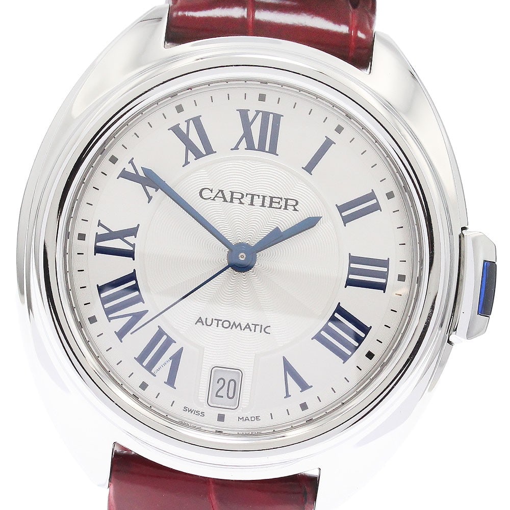 Cartier Cle de Cartier WSCL0017 automatic date womens wristwatch: Cartier Cle de Cartier WSCL0017 automatic date womens wristwatch Cartier Cle de Cartier date automatic women's wristwatch with a stainless steel case, silver dial, and leather strap. The watch-only of