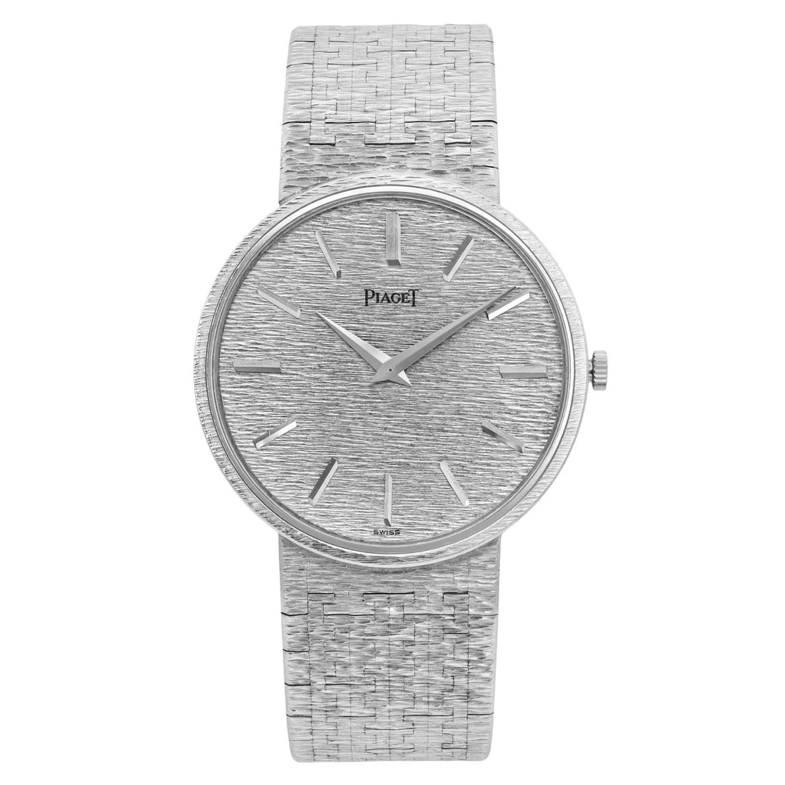 Piaget Classic 32MM 18K White Gold Mechanical Watch Vintage 1971: Piaget Classic 32MM 18K White Gold Mechanical Watch Vintage 1971 Presenting the Piaget Classic Mechanical Watch, a stunning timepiece crafted in Switzerland. This vintage wristwatch features an elegan