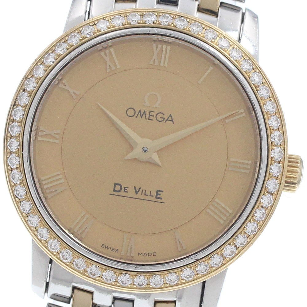 OMEGA De Ville Prestige 413.25.27.60.08.001 Womens Quartz Watch: OMEGA De Ville Prestige 413.25.27.60.08.001 Womens Quartz Watch OMEGA De Ville Prestige ladies wristwatch with a diamond bezel and gold dial. This quartz model is presented as watch only, with no acce