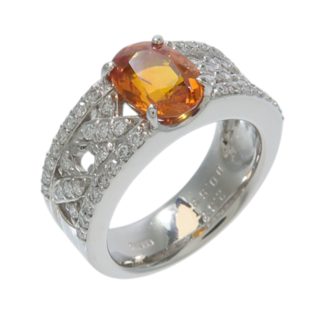 Pt900 Platinum Ring with Orange Sapphire and 0.53ct Diamond US 6: Pt900 Platinum Ring with Orange Sapphire and 0.53ct Diamond US 6 Orange sapphire and diamond ring crafted in Pt900 platinum. This women's ring features an orange sapphire accented by diamonds and come