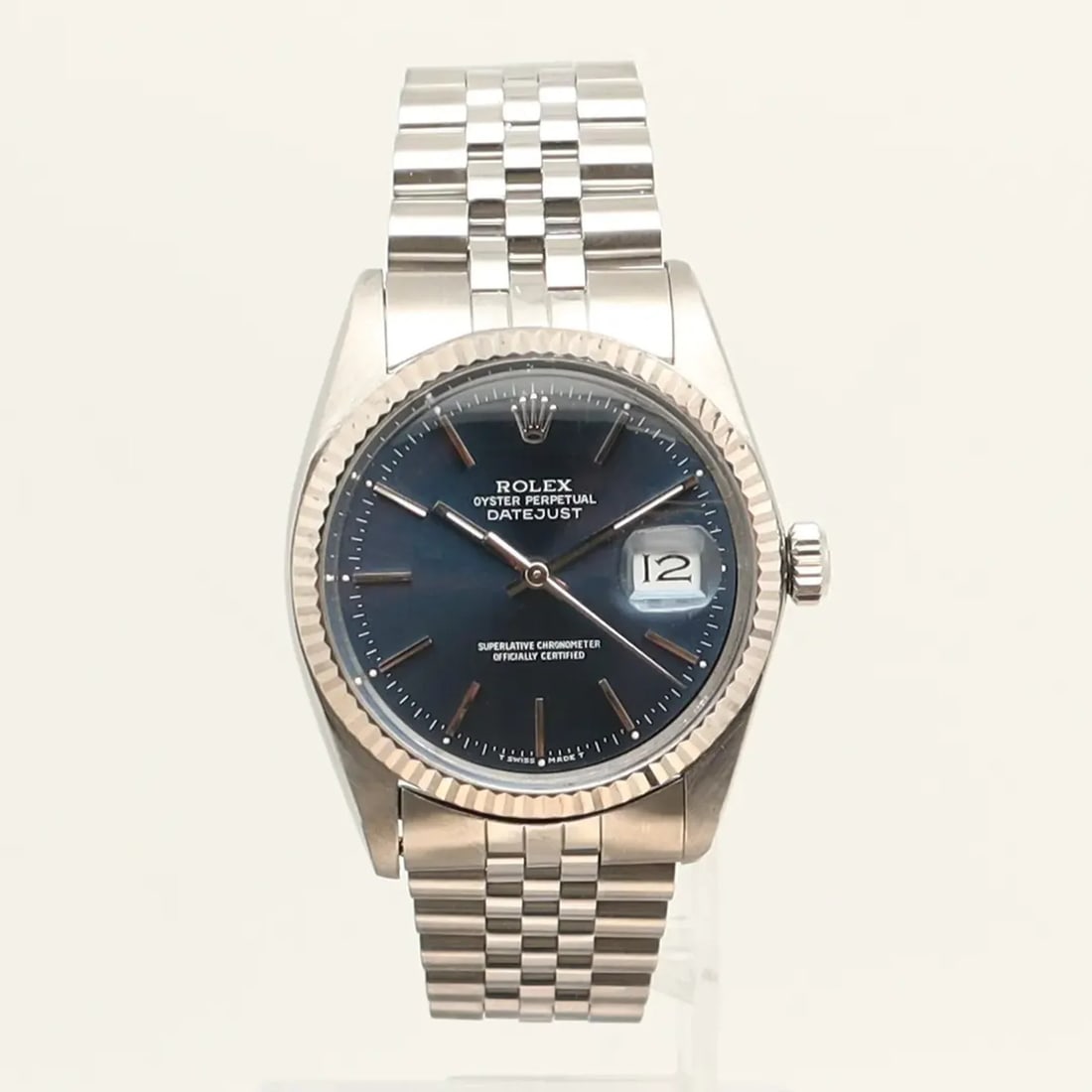 Rolex Datejust 16014 automatic wristwatch blue dial 36mm steel gold: Rolex Datejust 16014 automatic wristwatch blue dial 36mm steel gold Vintage Rolex Datejust wristwatch with a blue sunburst dial and automatic movement. This men's watch features a fluted fixed bezel, 