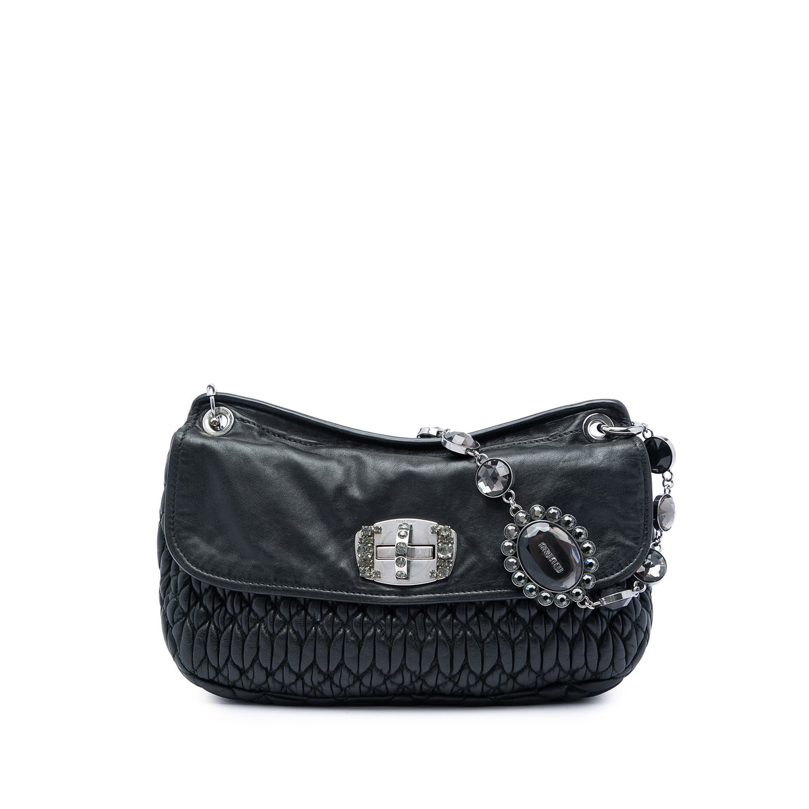 Black Leather Crossbody Bag Miu Miu Matelasse Nappa Crystal Flap: Black Leather Crossbody Bag Miu Miu Matelasse Nappa Crystal Flap Miu Miu Matelasse Nappa Crystal Flap Crossbody bag in black leather with a chain strap accented by crystal details. The design includes