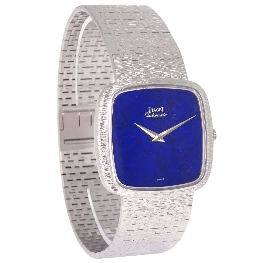 Piaget Tradition 31mm manual wind wristwatch in 18K white gold: Piaget Tradition 31mm manual wind wristwatch in 18K white gold Piaget Tradition wristwatch with a lapis-lazuli dial and classic analog display. This manual-winding women's watch features a white gold 